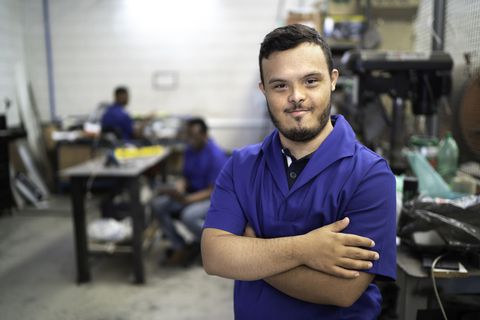 Young man at manufacturing shop