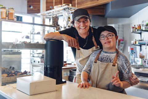 Young man working at coffee shop